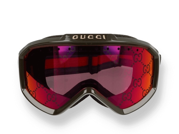 Occhiali da sole Gucci GG1210S 003 di materiale inniettato e di colore nero con forma mascherina frontale
